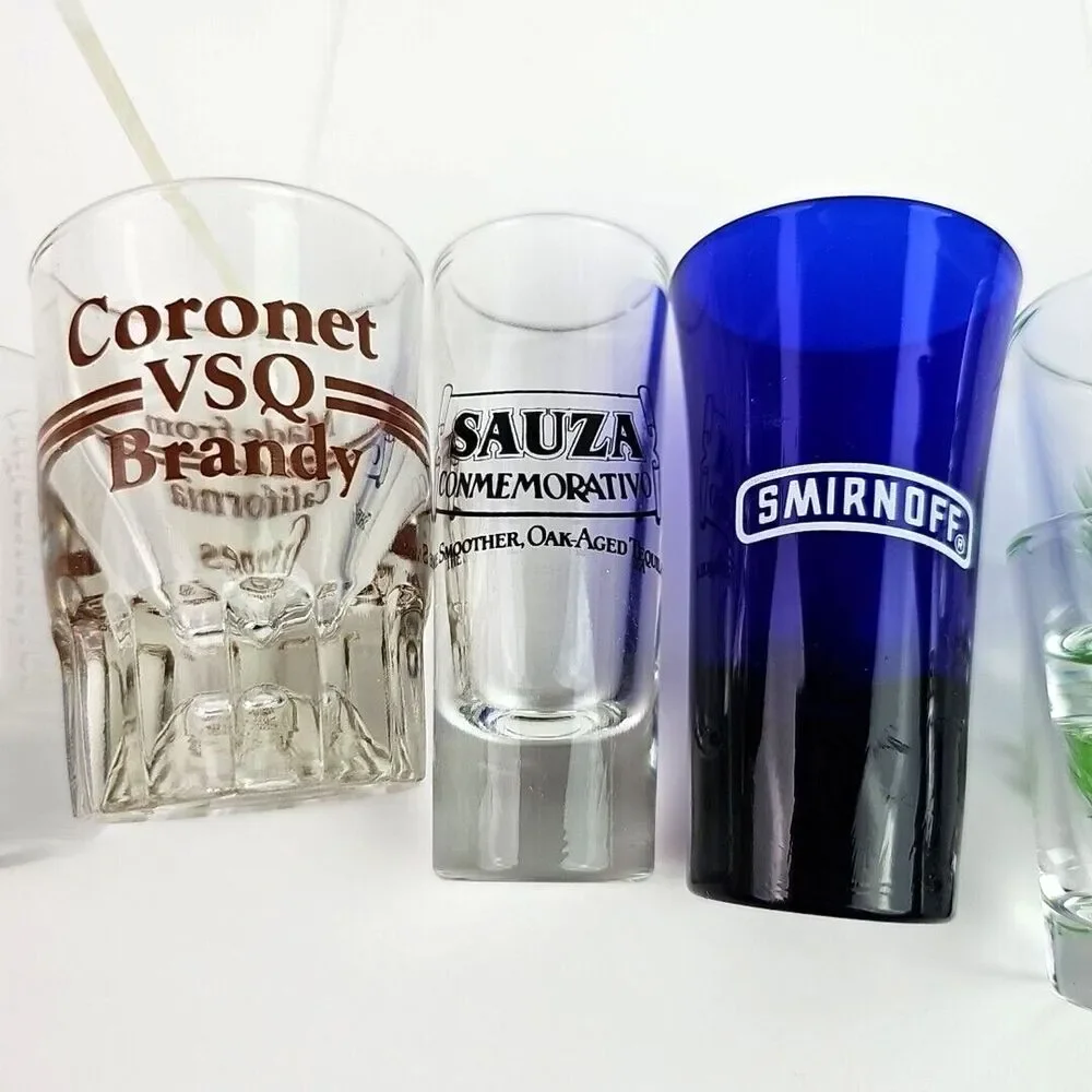Lot of 11 Collectible Shot Glasses Smirnoff Bushmills Sauza Hornitos Brickyard